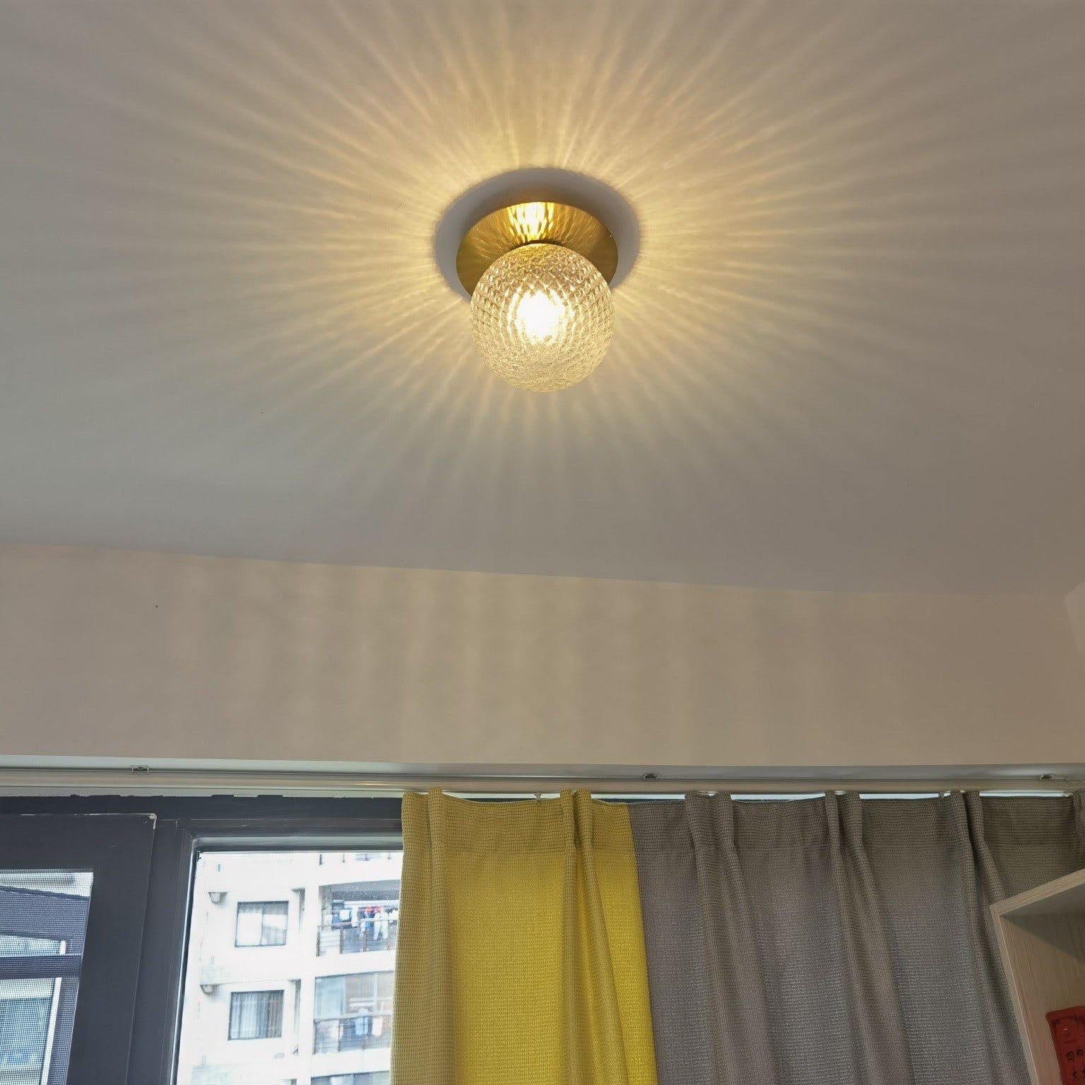 Lumza Orb Wandleuchte